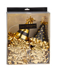 Packaged New Year's Eve hats with gold confetti and black ribbons.