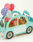 pop up 3d card featuring blue car with dogs inside, with area to write a message