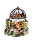 Detailed model of a miniature garden with a clear dome on a white background