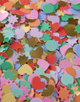 Colorful confetti with heart and star shapes on a white background