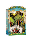 Moomin themed theater miniature set with moomin characters having a feast, on white background