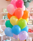a bundle of rainbow balloons