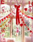 Decorative window with 'LOVE' and heart shapes for Valentine's Day.
