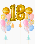 Two rainbow balloon bouquets with a gold round balloon and printed text reading "Happy Birthday" Gold number balloons "18" in the center.