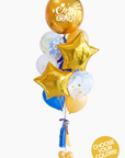 A balloon bouquet with a 'Congrats!' balloon, gold star-shaped foil balloons, blue and white latex balloons, and decorative elements arranged together.