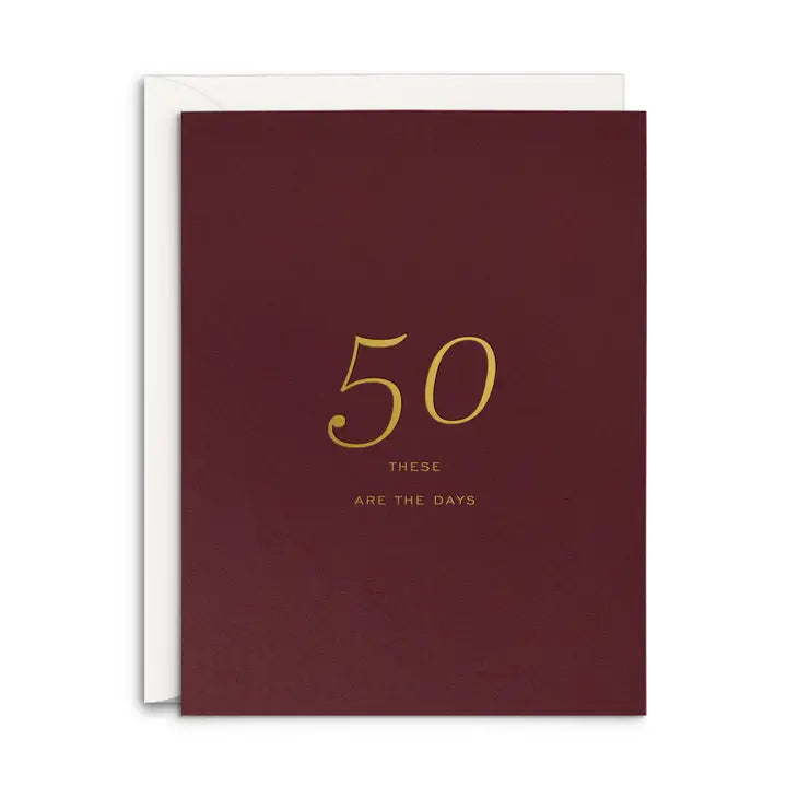 Maroon card with gold text '50 These Are the Days' on a white background