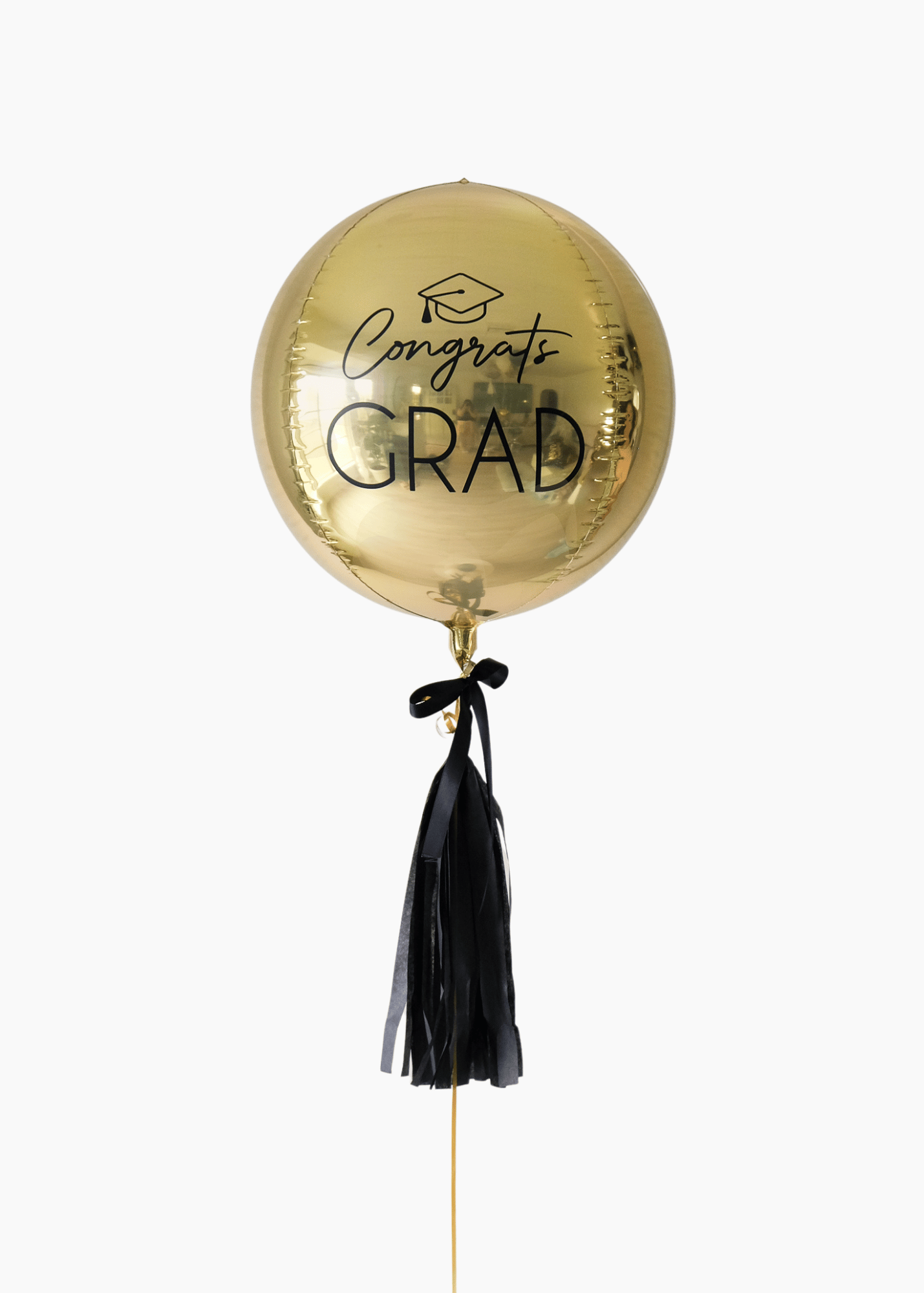 custom grad balloon with bow and tassel on white background