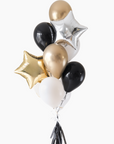Balloon bouquet with gold, black, and silver star balloons on a white background