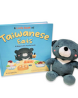 A children's book titled 'A Little Book of Taiwanese Eats' accompanied by a plush bear toy.