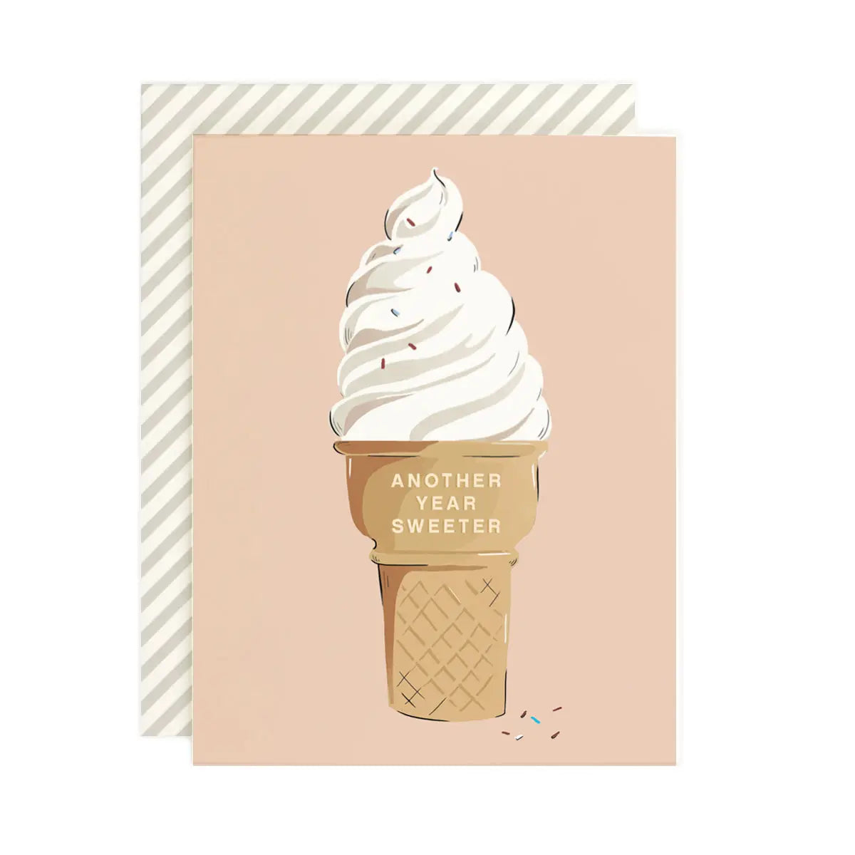 A birthday card with an illustration of a ice cream cone on a pink background, with the text 'ANOTHER YEAR SWEETER' written on it.