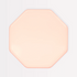 A blush pink octagonal ceramic plate designed for tableware.