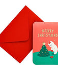 Red envelope and Christmas-themed card with a polar bear and tree illustration on a white background