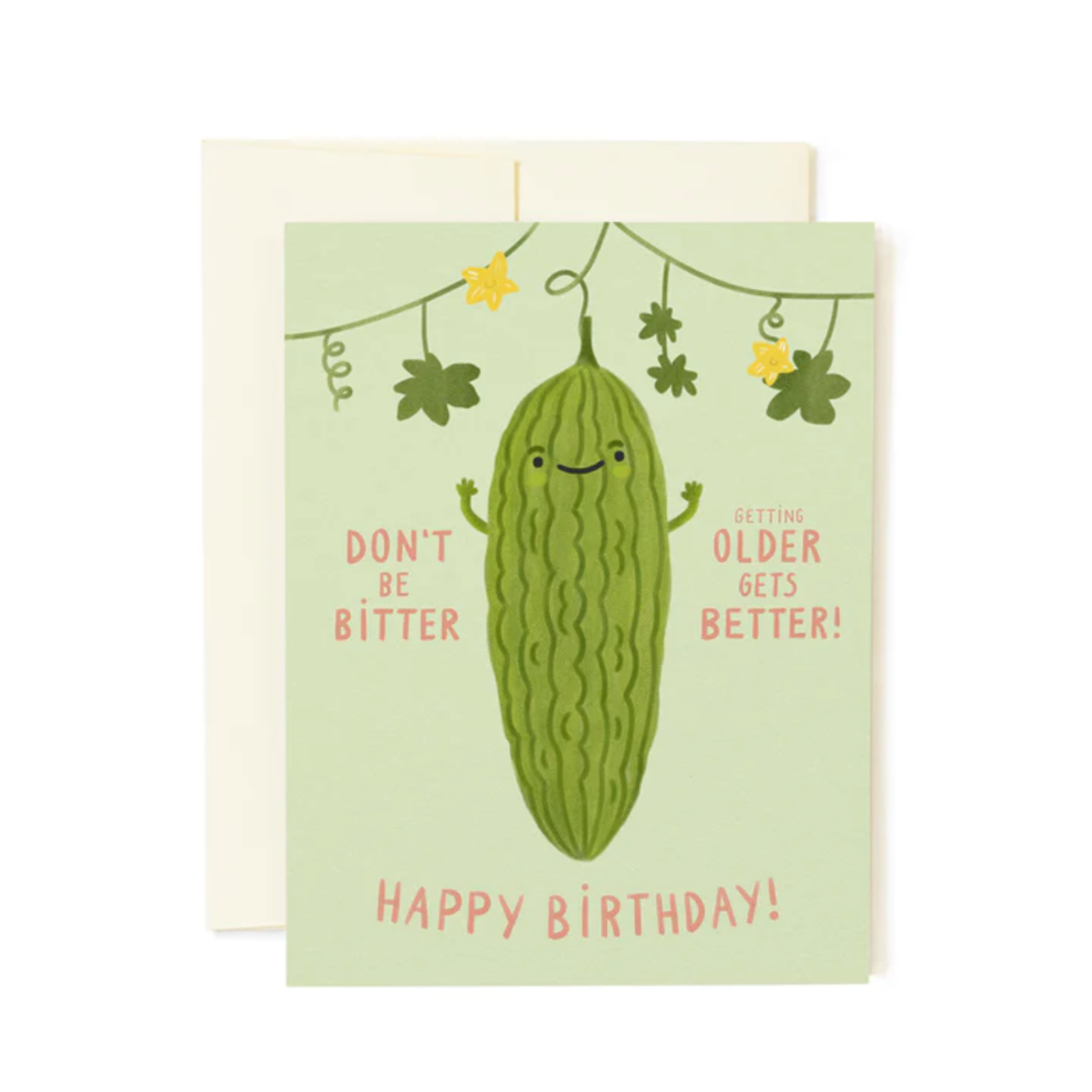 A birthday card with an illustration of a bitter melon with a smiling face, surrounded by leaves and flowers. The text on the card reads 'Don't be bitter, older &amp; wiser is better! Happy Birthday!'.