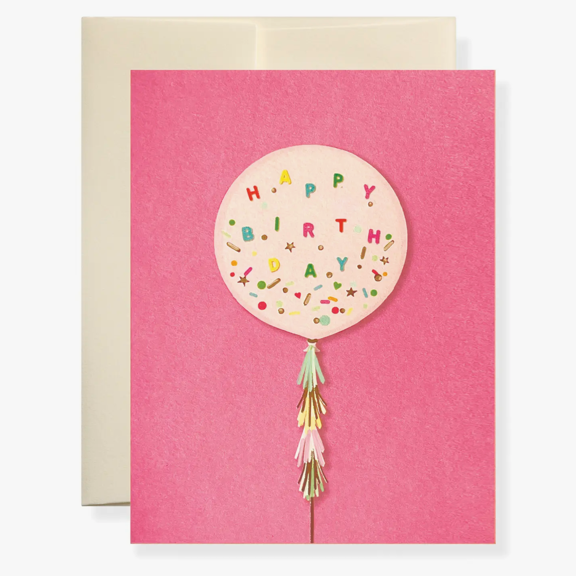 A greeting card with a pink background featuring an illustration of a large pink balloon with 'Happy Birthday' text and decorated with gold foil embellishments. The card is paired with a natural white envelope.