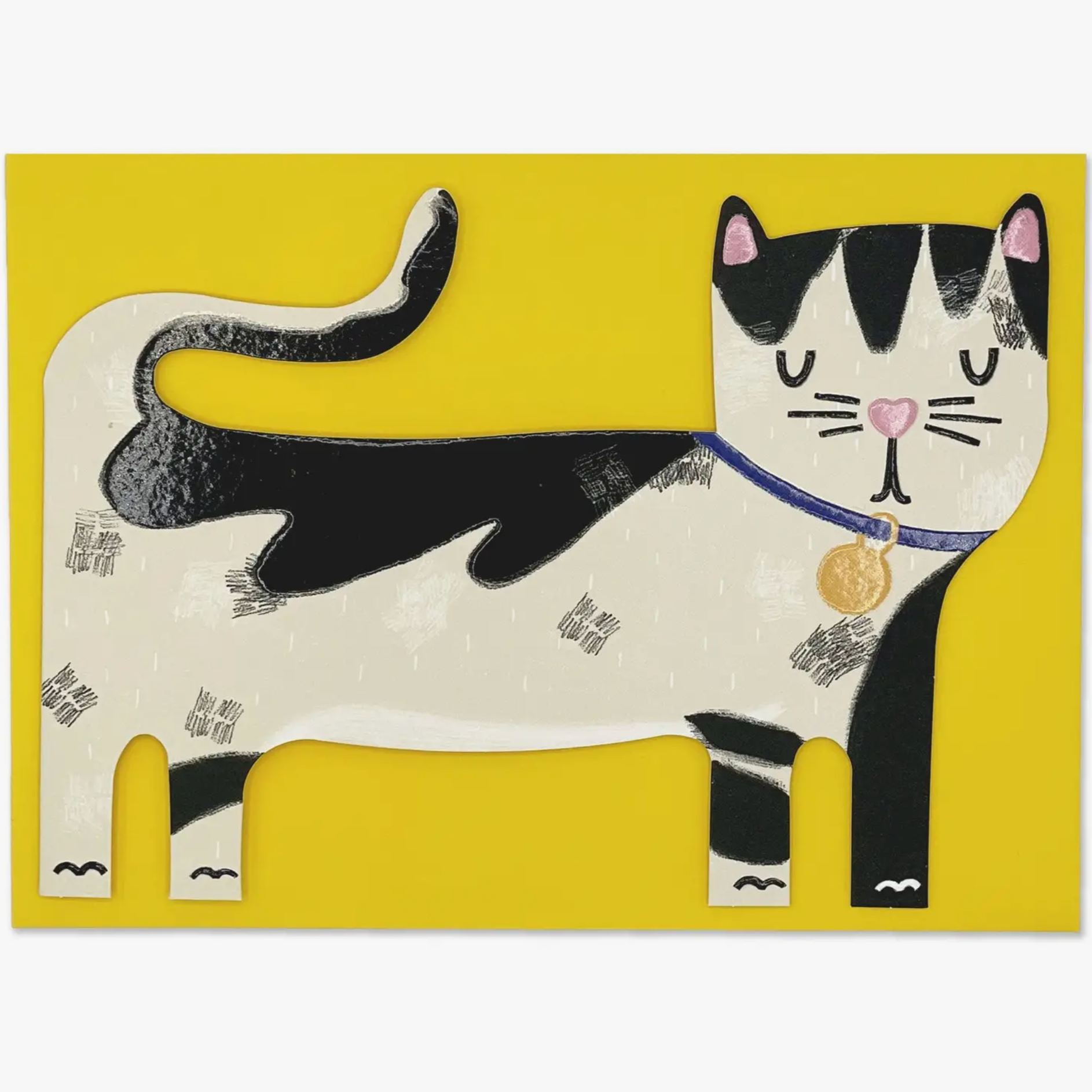 A greeting card shaped like a black and white cat with a yellow envelope.
