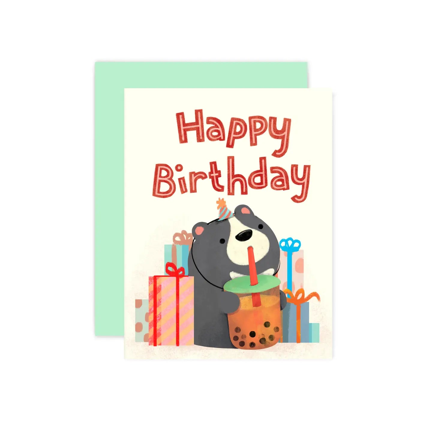 A greeting card with an illustration of a cute cuddly bear holding a boba milk tea, along with a blank card and a matching envelope.
