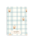 Notebook with blue and white checkered pattern and small illustrations on a white background