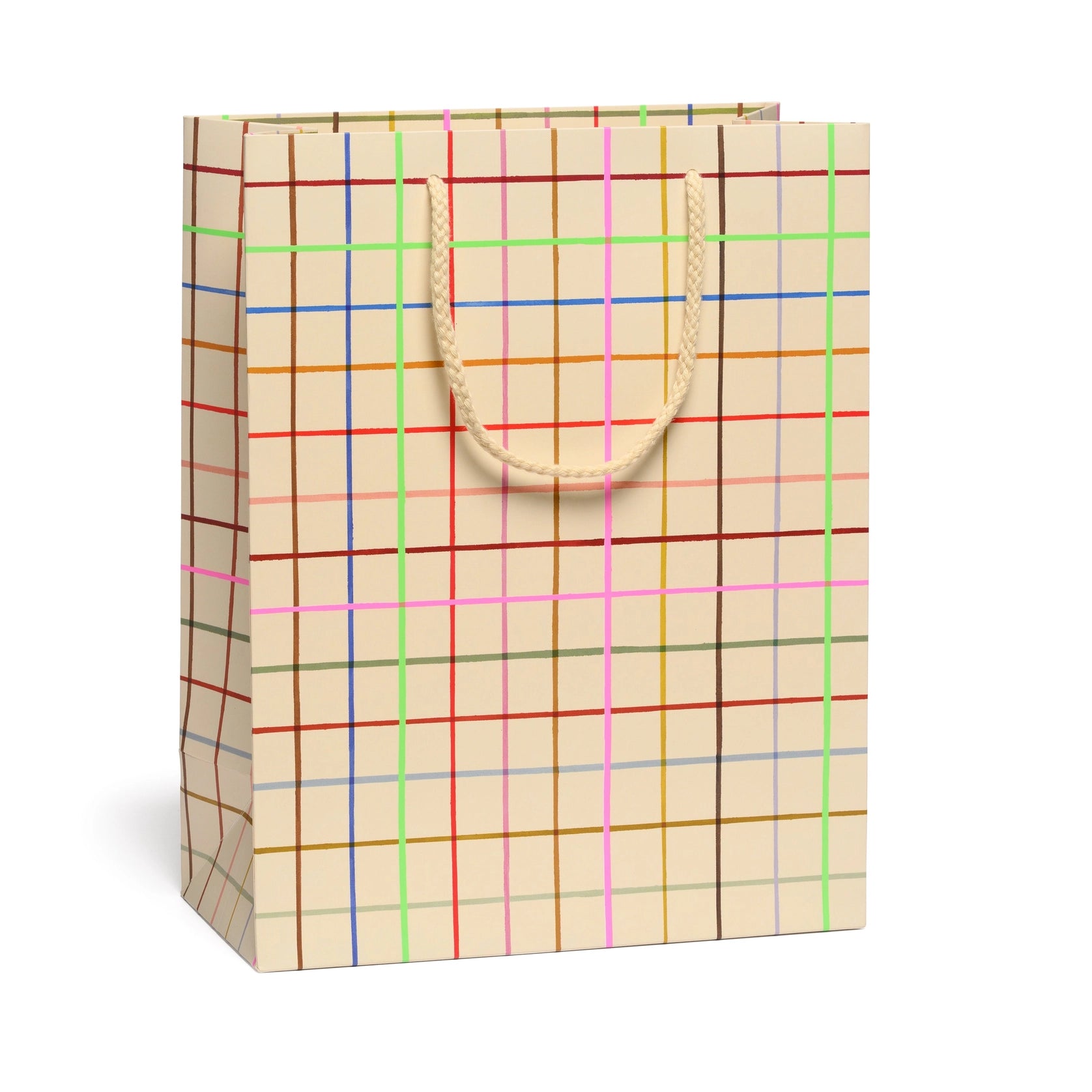 tan gift bag with colorful grid lines on white background