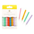 Packaging of colorful bobbly candles with sample candles displayed on a white background.