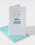 mini white notecard with confetti and text "woohoo!"