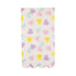 A rectangular dinner napkin with conversation hearts in pastel colors