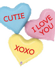 A trio of pastel hearts with red text reading "cutie" "I love you" and "xoxo"
