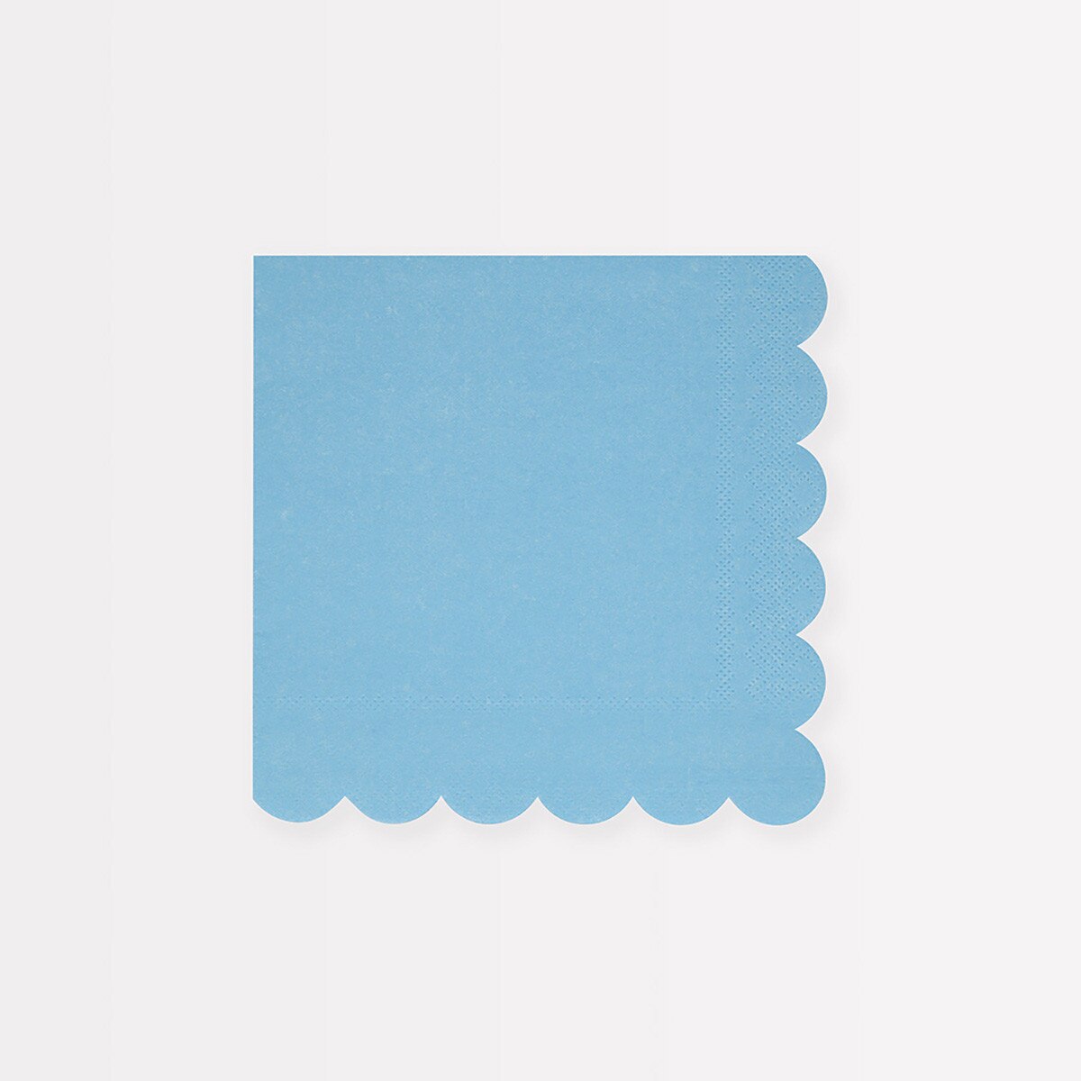 Light blue scalloped edge napkin on a white background