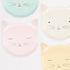Four pastel-colored cat faces on a white background