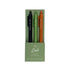 Set of three pens in black, green, and orange with a green packaging on a white background.