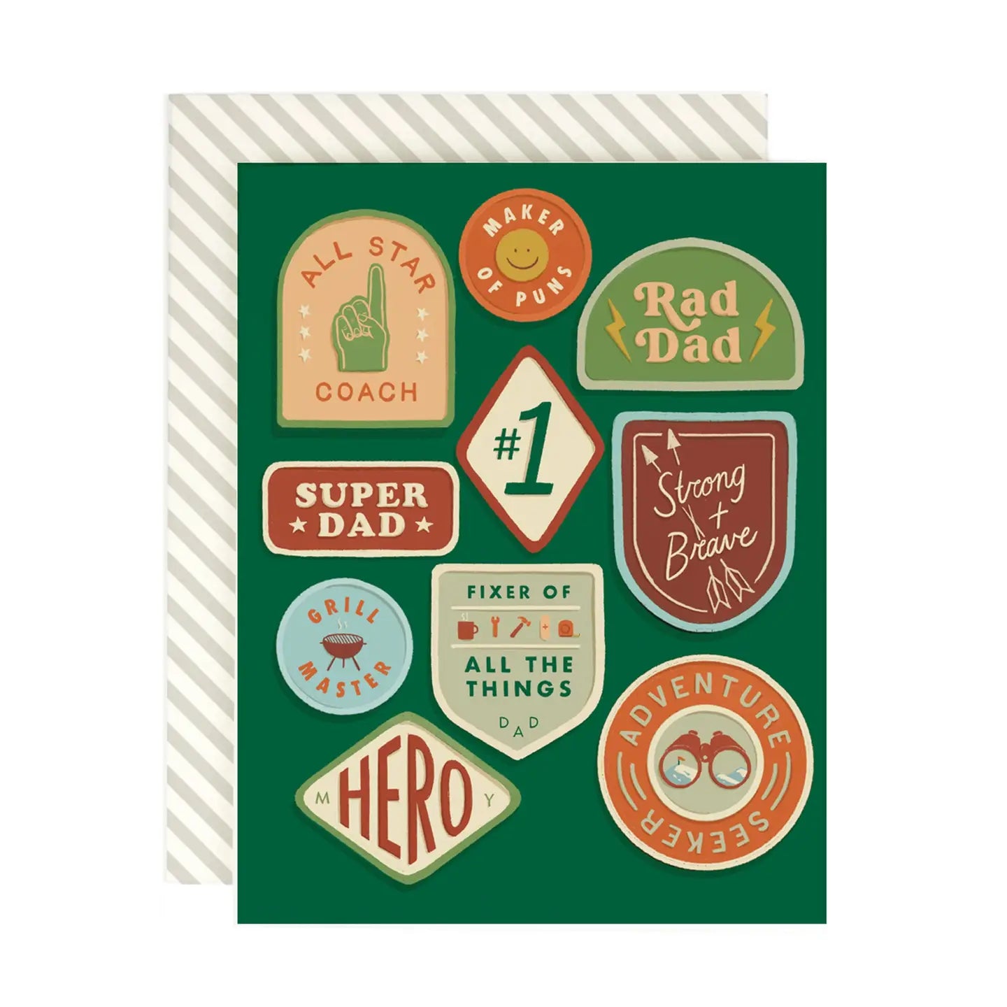 A Father's Day greeting card with various merit badges and titles for dad, such as 'All Star Coach' and 'Rad Dad', on a green background. It includes a striped envelope.