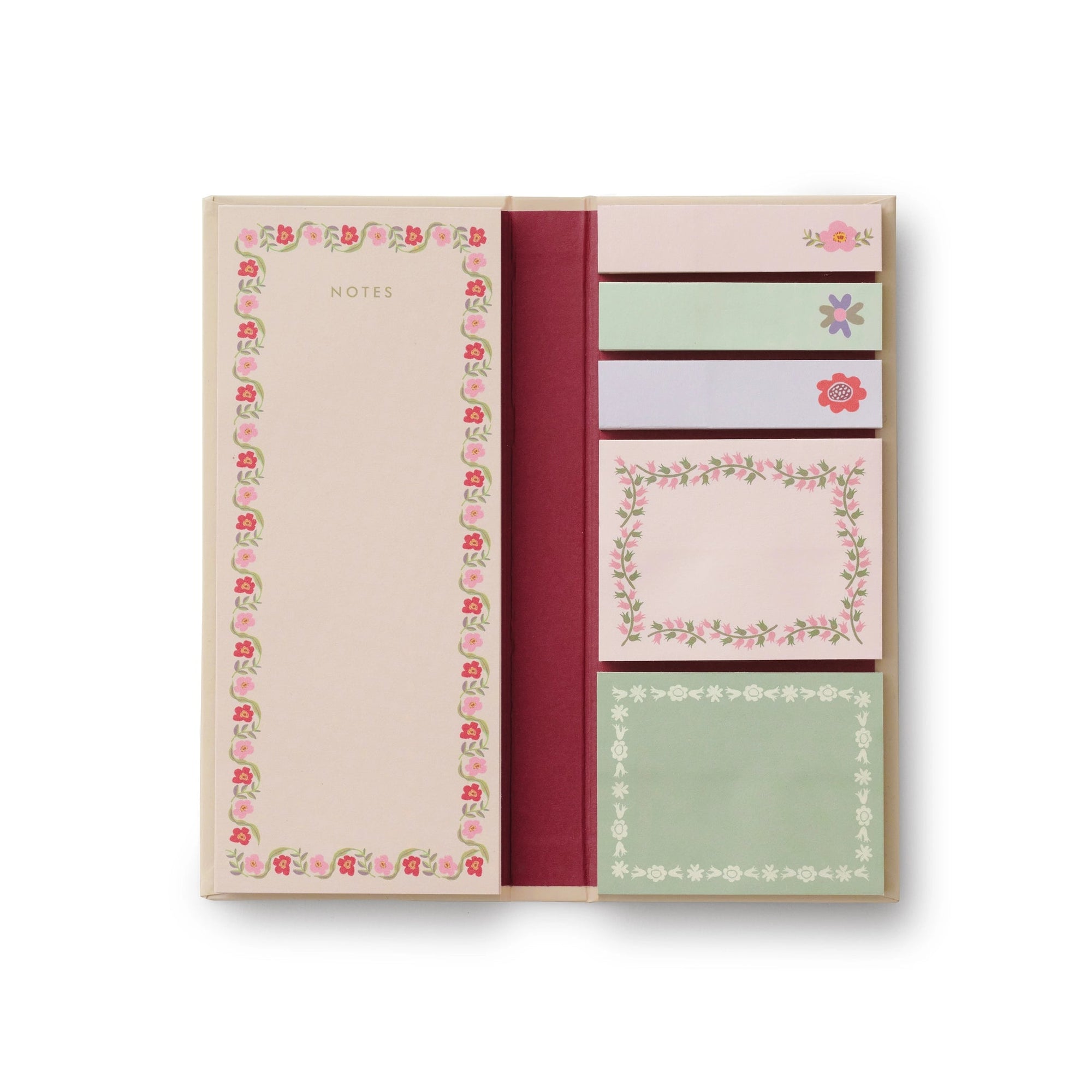 Set of stationery items including a notebook and sticky notes with floral designs on a white background.
