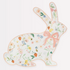 A floral-patterned bunny-shaped plate with gold foil details, featuring a variety of flowers, strawberries, and a bow.