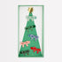 Pastel color bow hair clips on a decorative box with a green christmas tree and gold star. White background.