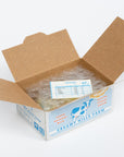 Open cardboard box with a label inside, on a white background