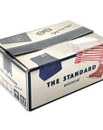 Box with 'The Standard Wardrobe' text and clothing illustrations visible on a white background