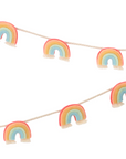 A felt rainbow garland with white cotton fringe effect and rope for hanging