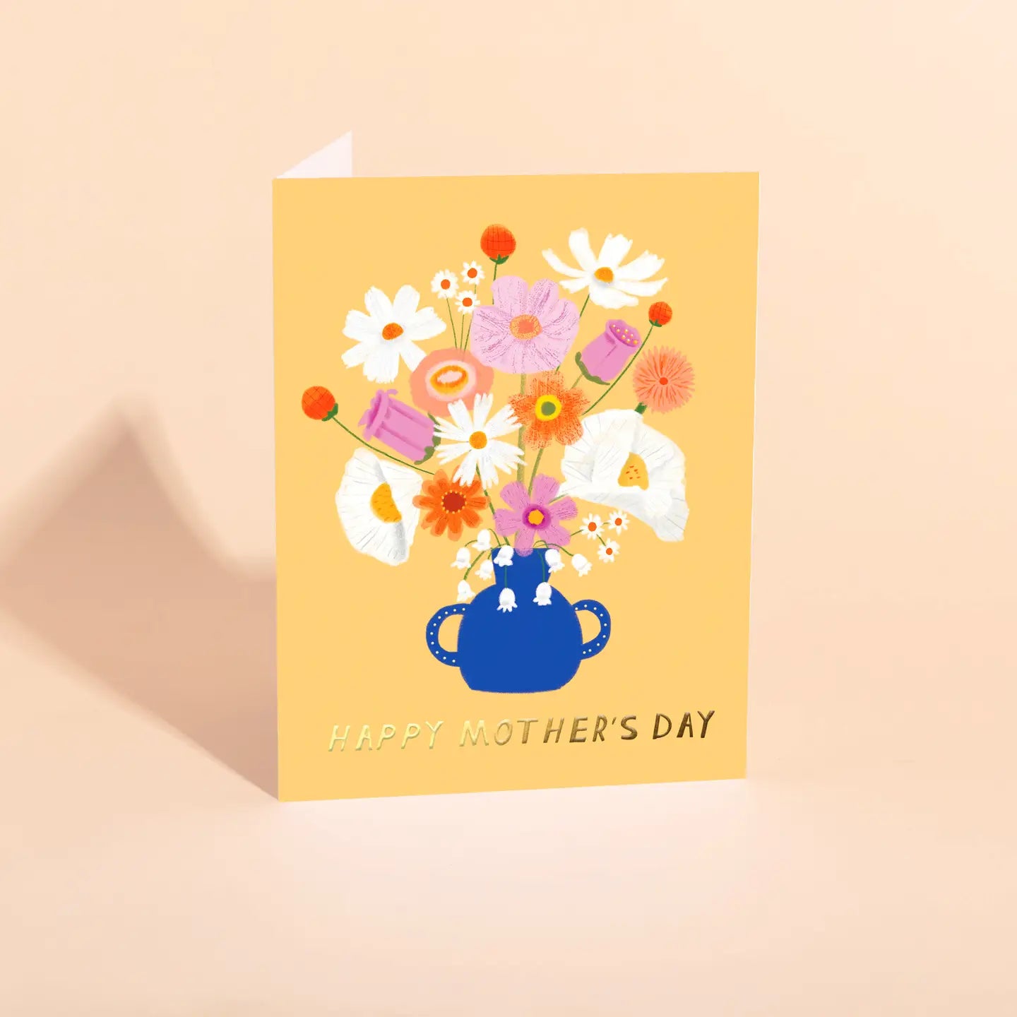 A Mother's Day card with a colorful illustration of flowers in a blue vase, with the text 'HAPPY MOTHER'S DAY' on a yellow background.