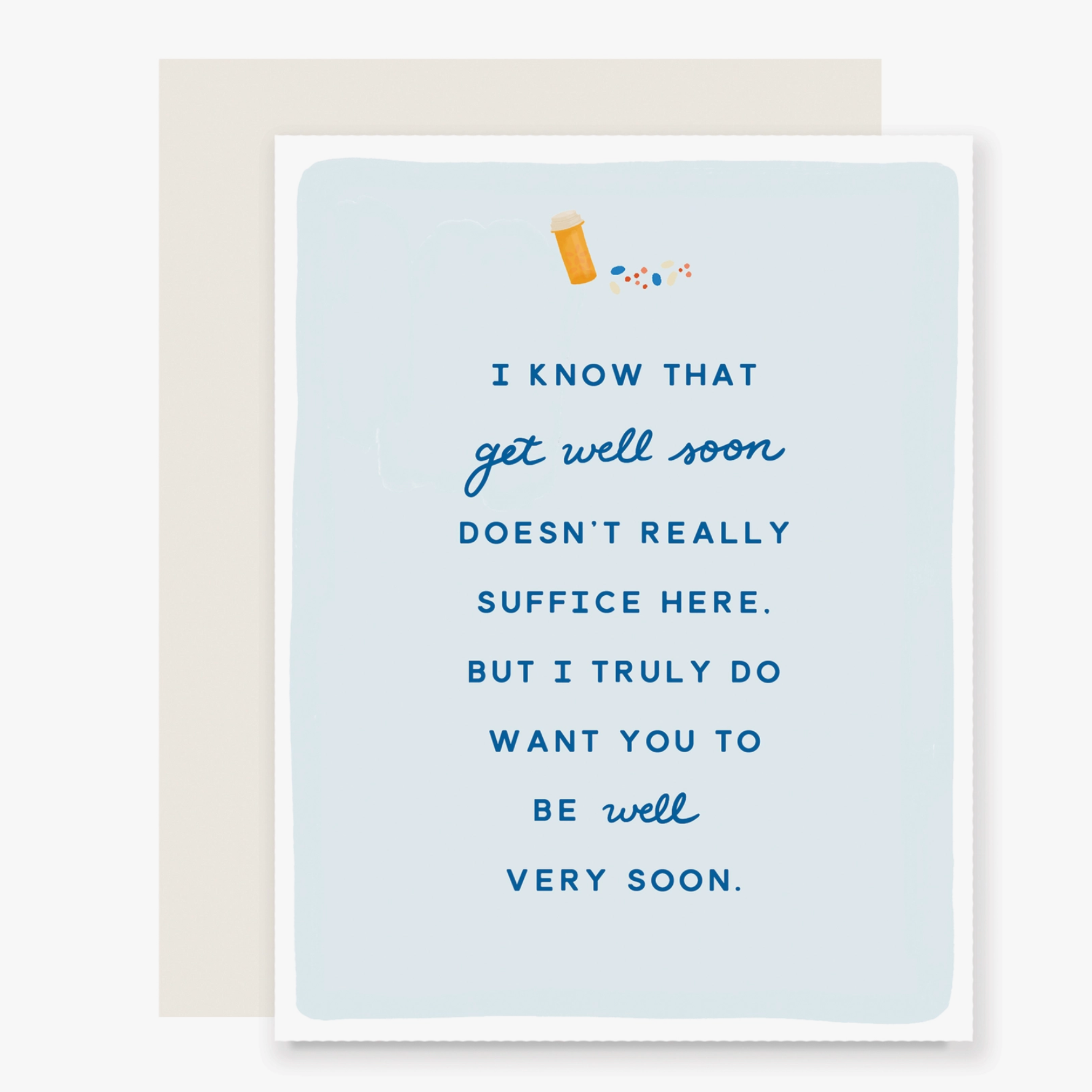 A folded card with a blue background, text that reads 'I KNEW THAT GET WELL SOON DOESN'T SUFFICE HERE BUT I TRULY WANT YOU TO BE WELL SOON.' and a small illustration of a pill.