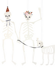 Three skeleton figures with decorative elements on a white background