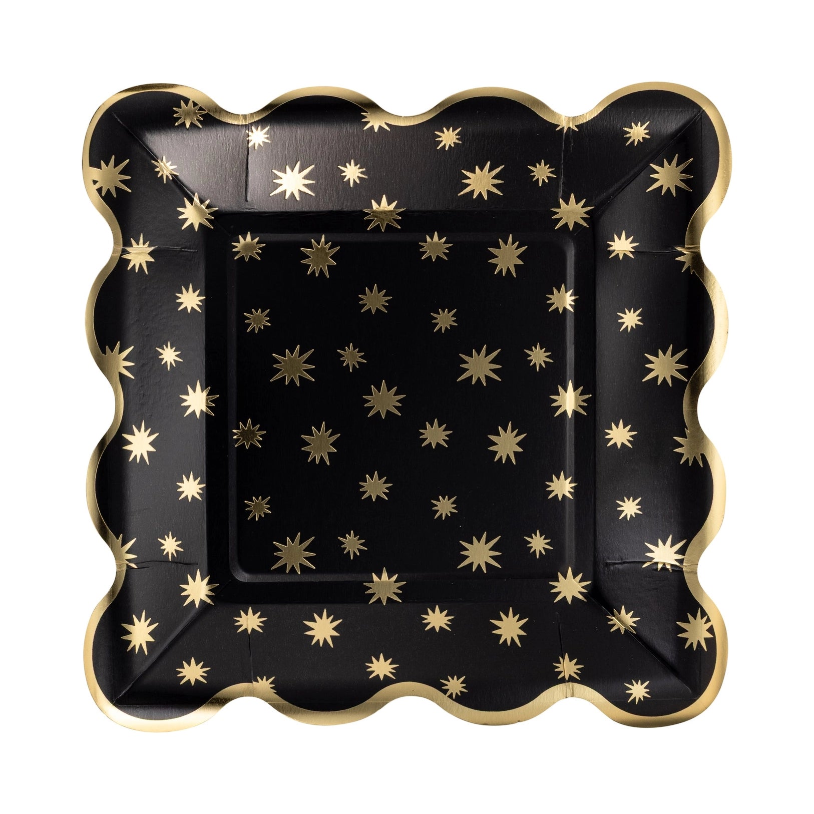 Black paper plate with gold star patterns on a white background