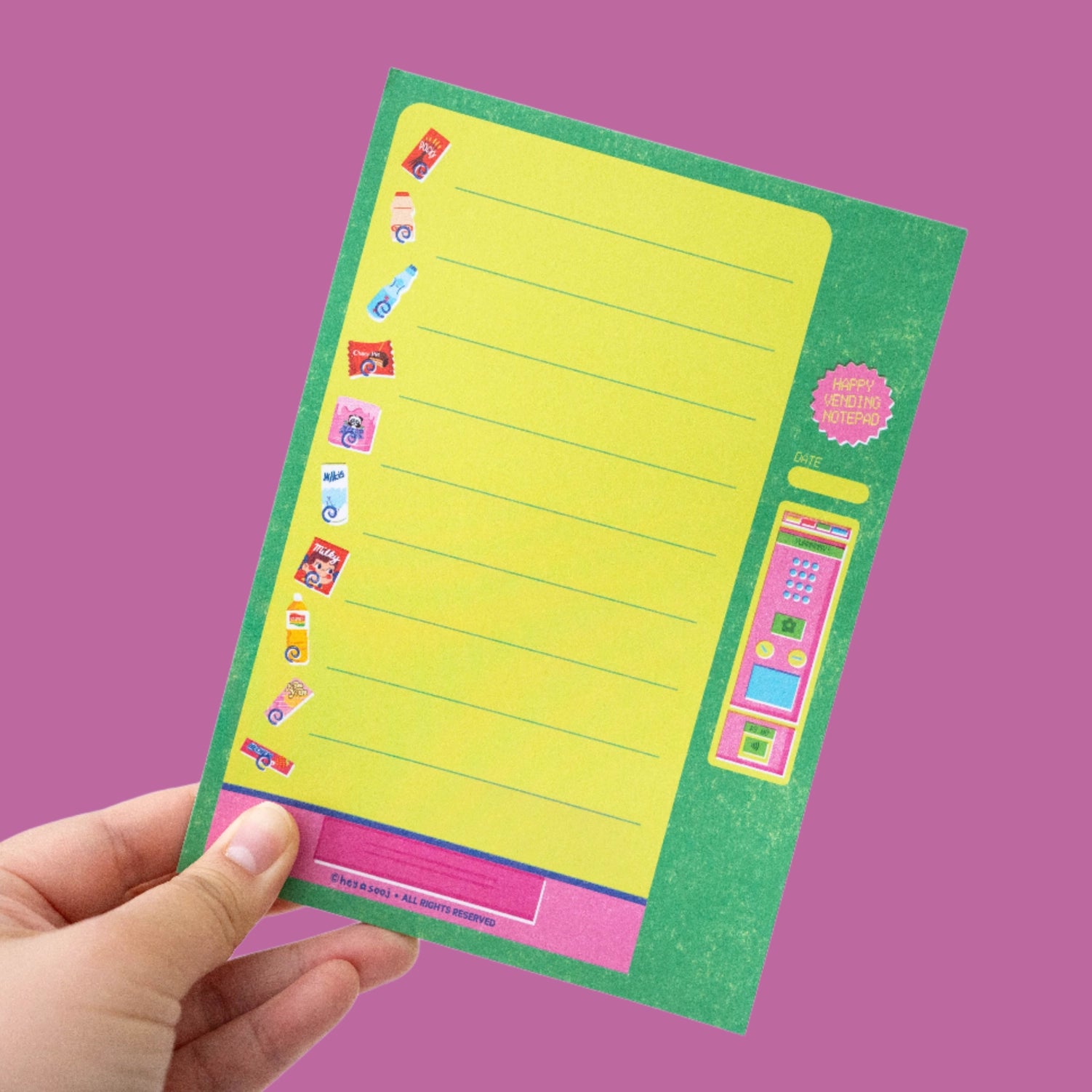 vending machine themed notepad on purple background