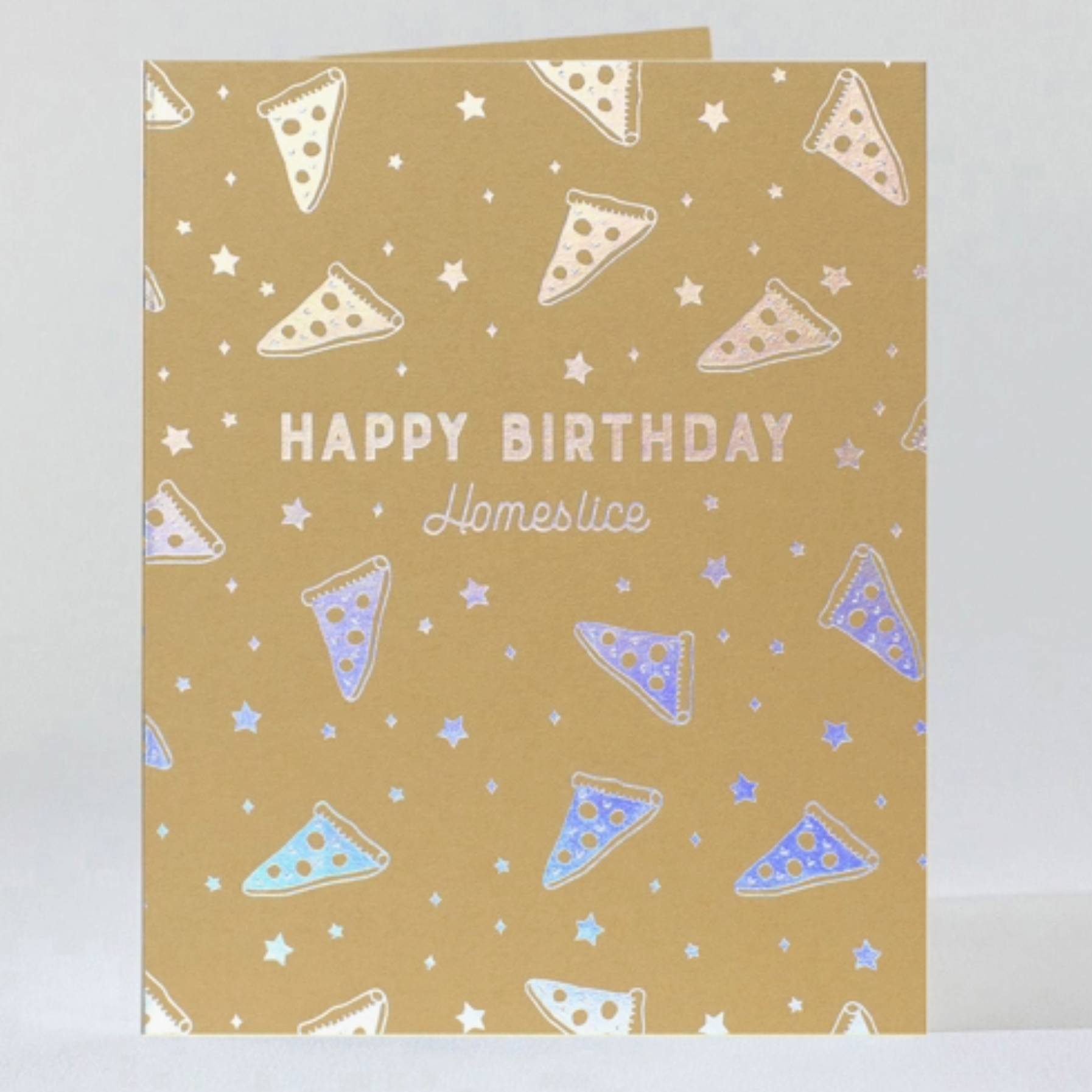 A greeting card with a holographic pizza pattern and the words 'Happy Birthday' and 'Homeslice' on the front, along with a matching envelope.