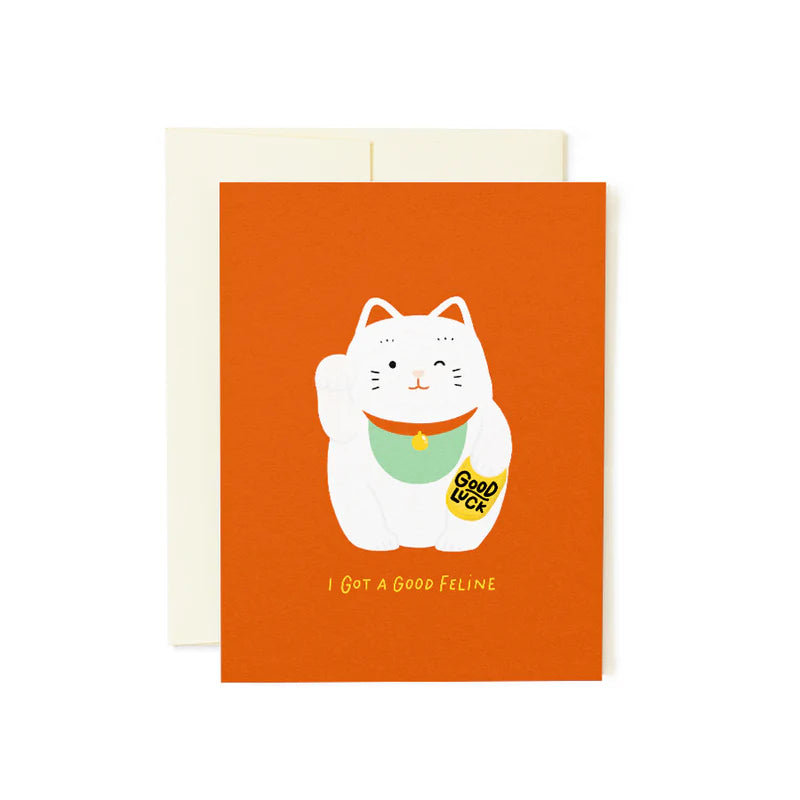 Greeting card with a white cat illustration and text on an orange background