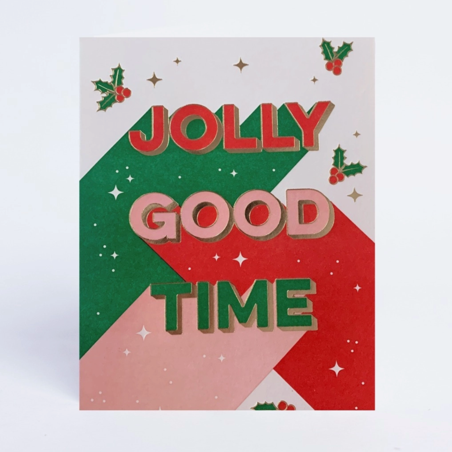 A folded Christmas card with a red and green color scheme, featuring the text 'Jolly Good Time' in a festive font, along with Christmas-themed decorations such as holly and snowflakes.