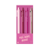 A boxed set of four gel pens in pink, light pink, burgundy, and champagne tones, displayed in a pink retail package. 