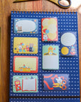 Notebook with colorful sticky notes on a wooden surface
