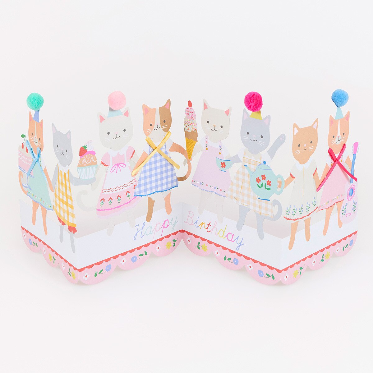 Birthday pop up card with cartoon cat designs on a white background