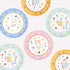 Set of colorful plates with cartoon cat characters and floral designs on a white background