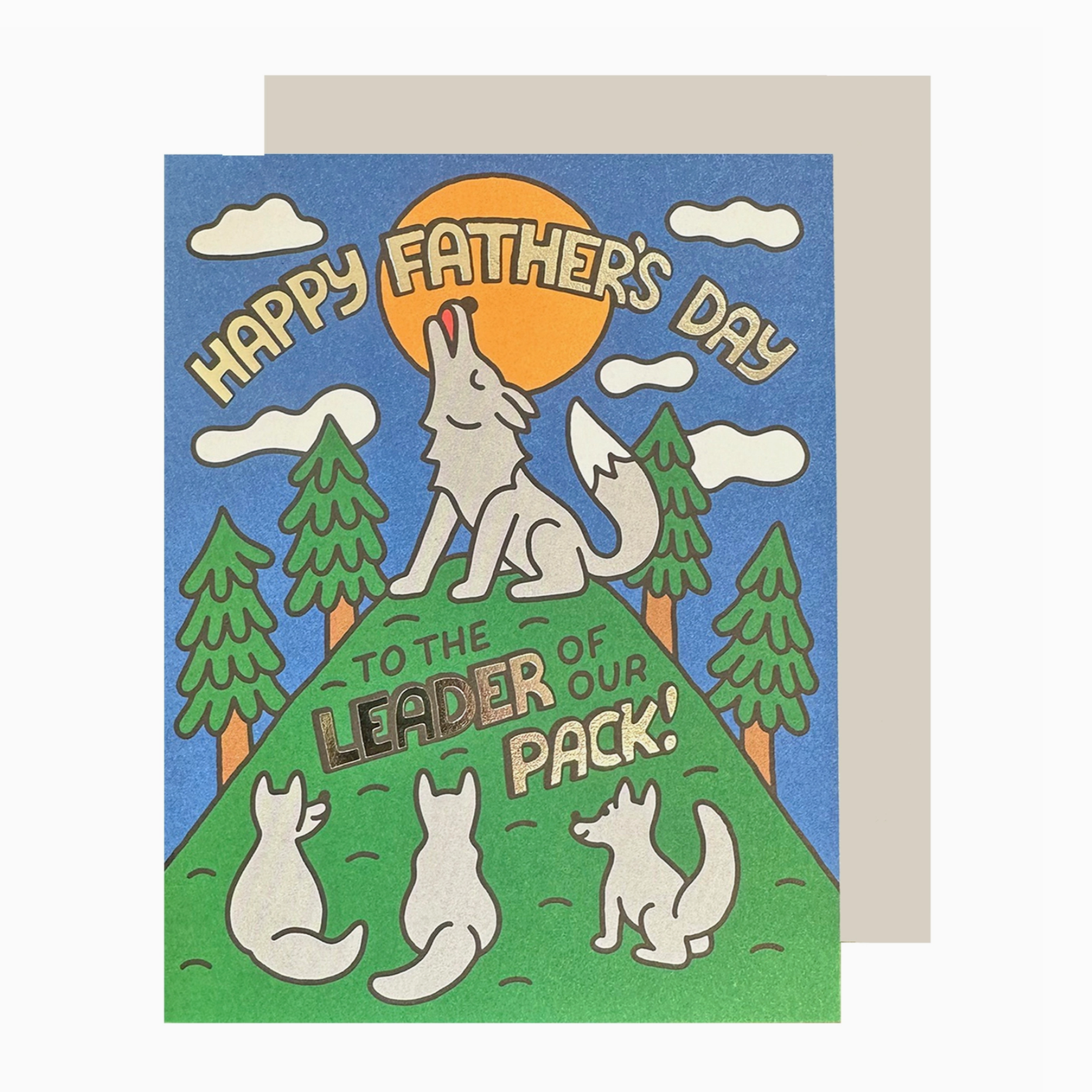 A Father's Day card with silver foil lettering, featuring an illustration of a wolf howling at the moon, surrounded by trees and text that reads 'Happy Father's Day to the Leader of Our Pack!'.