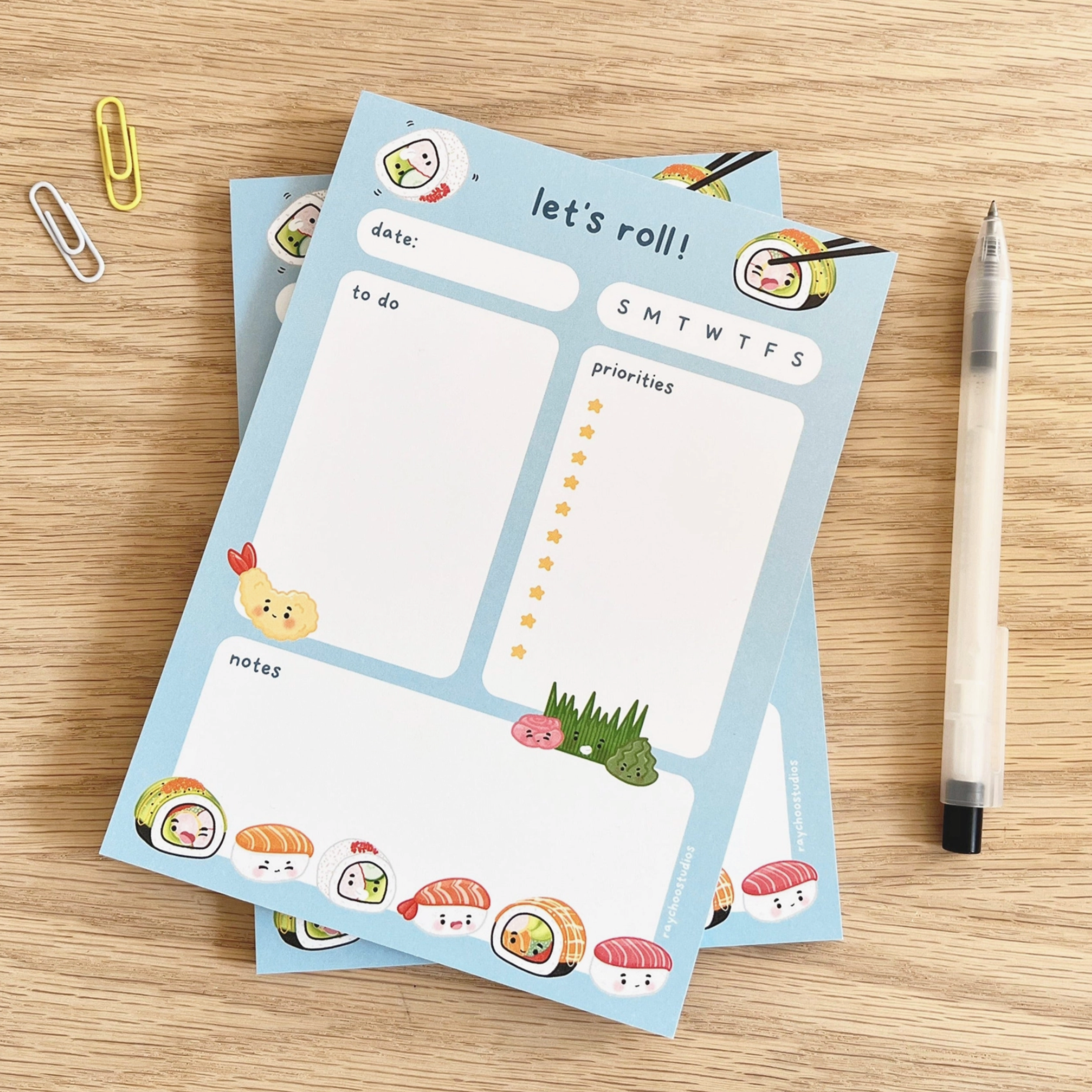 a notepad with sushi icons deorated around and a section for to do list, notes and priorities 
